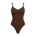 Women's seamless shapewear bodysuit with posture support, tummy control, and lift — front view